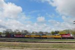 T4 quartet backs a lone CITX covered hopper to the CPKC interchange track